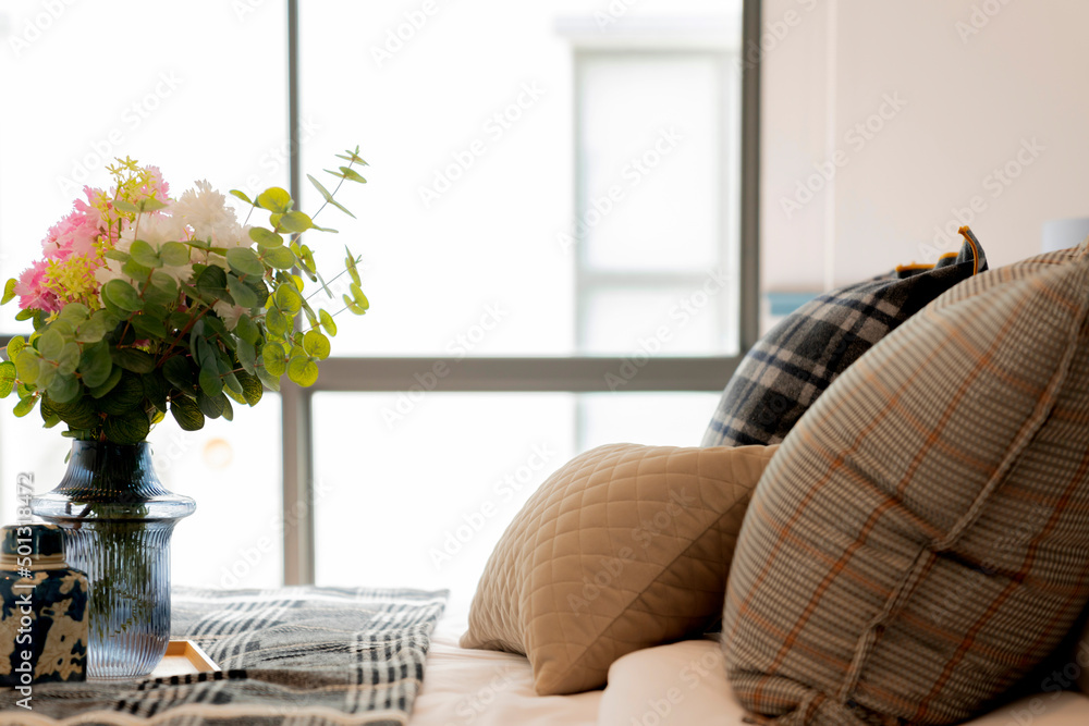 cosy bedroom interior close up soft bed arrange on white soft bed sheet in bedroom at home,interior 