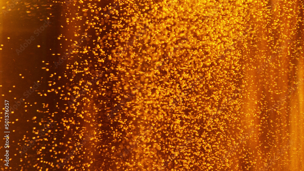 Macro photo of bubbling beer, closeup.