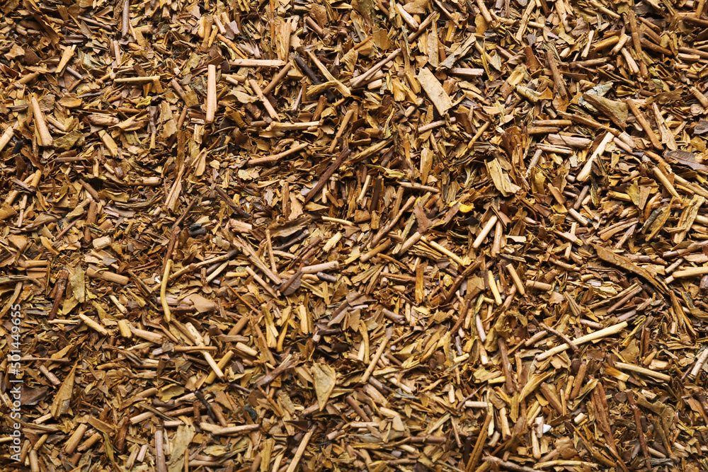 Heap of hojicha green tea as background, closeup