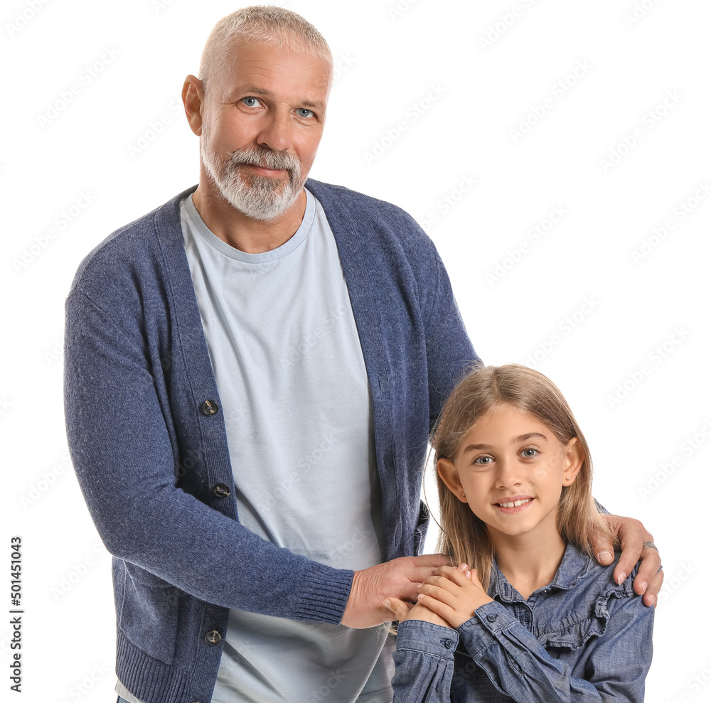 Senior man with his little granddaughter on white background