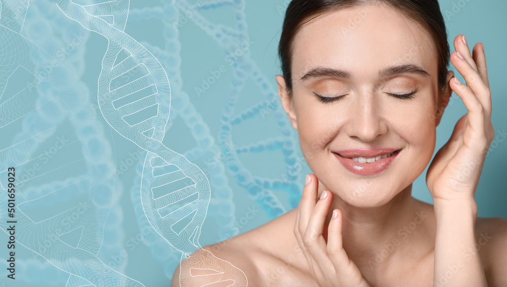 Beautiful young woman with healthy skin on blue background