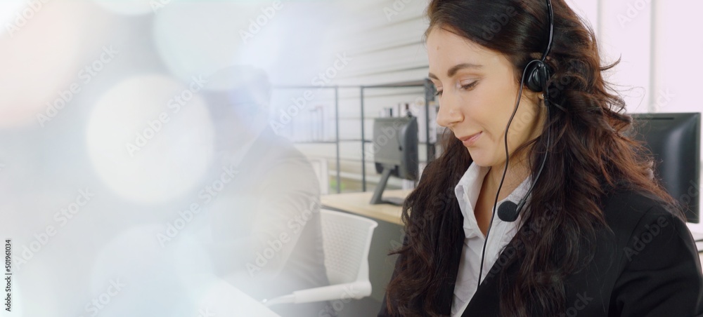 Business people wearing headset working in office to support remote customer or colleague. Call cent