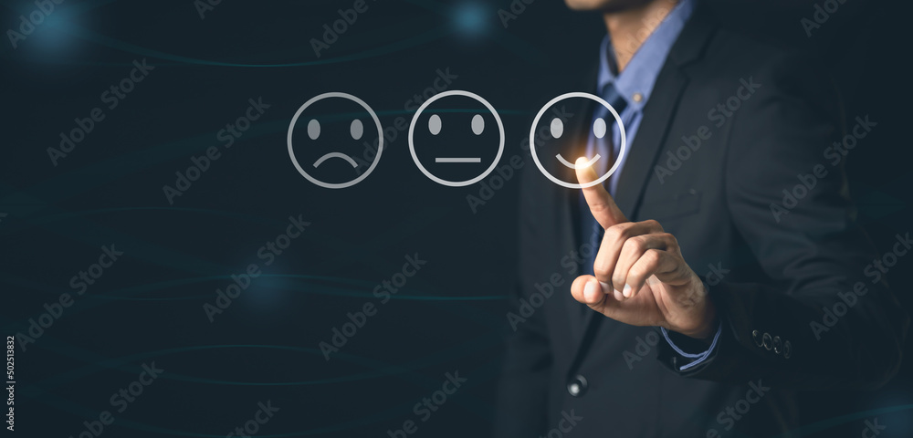 Customer Service and Satisfaction Concept Businessmen touch the virtual screen on happy smiley icons