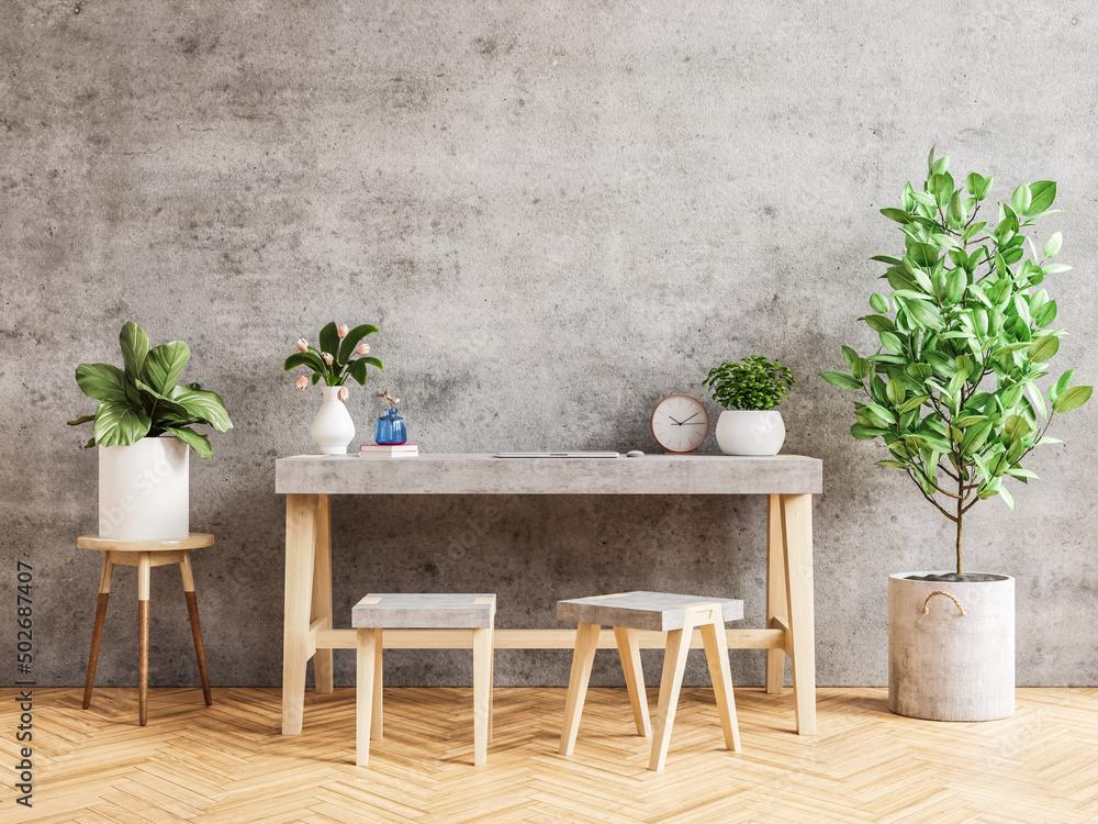 Table in office interior on concrete room,Modern workplace.