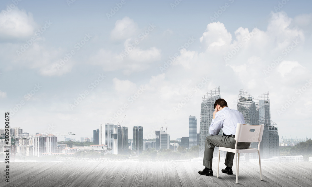 Businessman sitting on an office chair