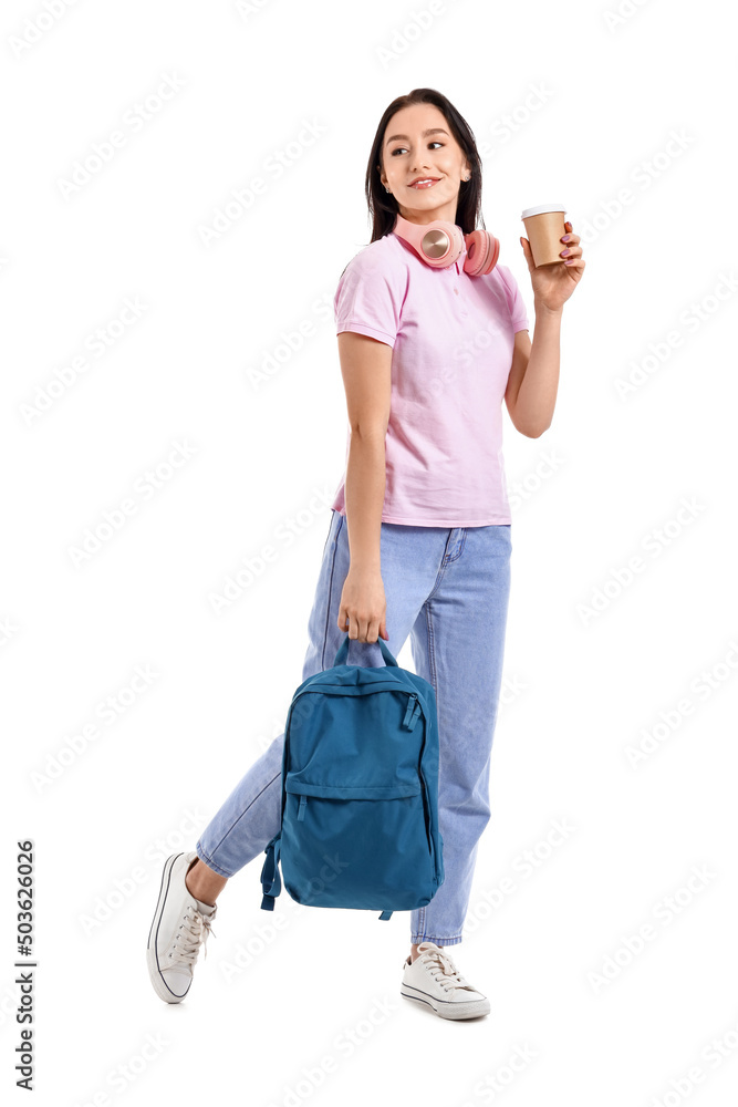 Portrait of beautiful female student with cup of coffee and backpack on white background