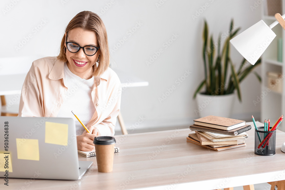 Female student studying in library