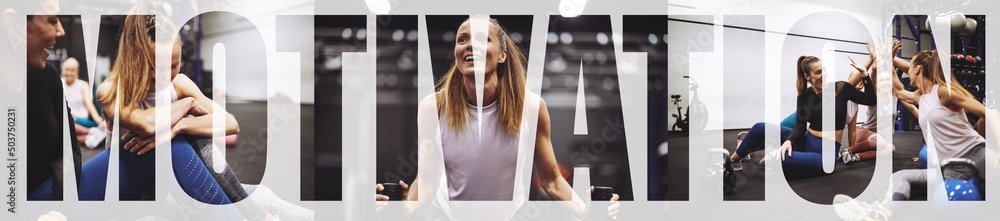 Smiling women working out together in a gym