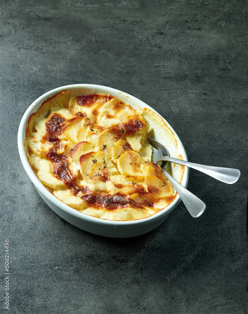 bowl of freshly baked potato gratin