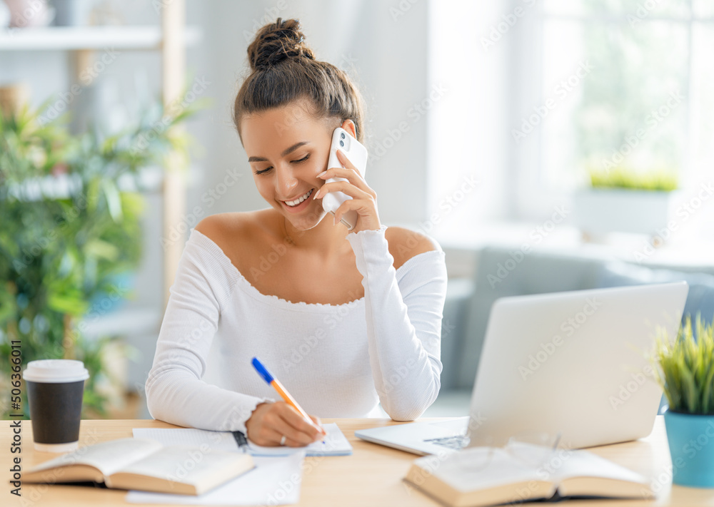 woman working on laptop at home