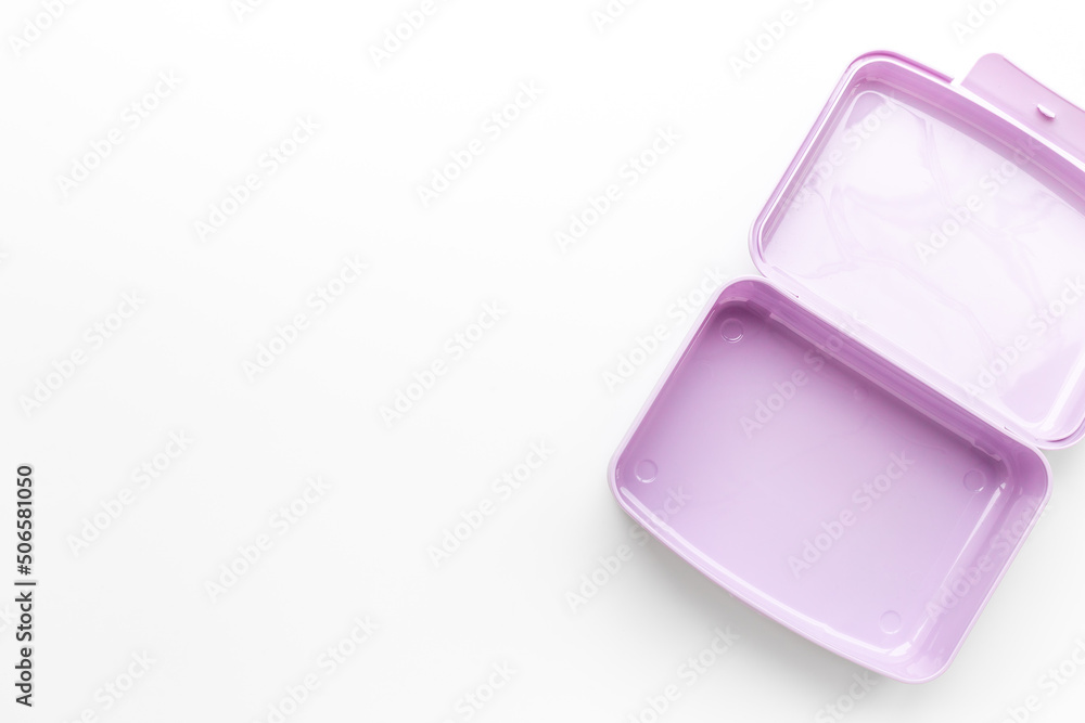 Empty plastic lunch box. Purple container for food, top view