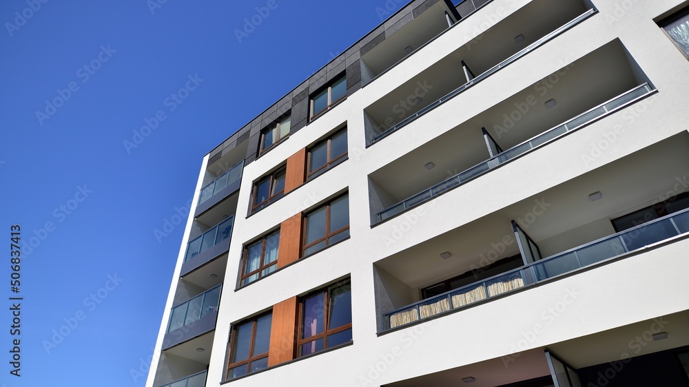 Apartment residential house and home facade architecture and outdoor facilities. Blue sky on the bac