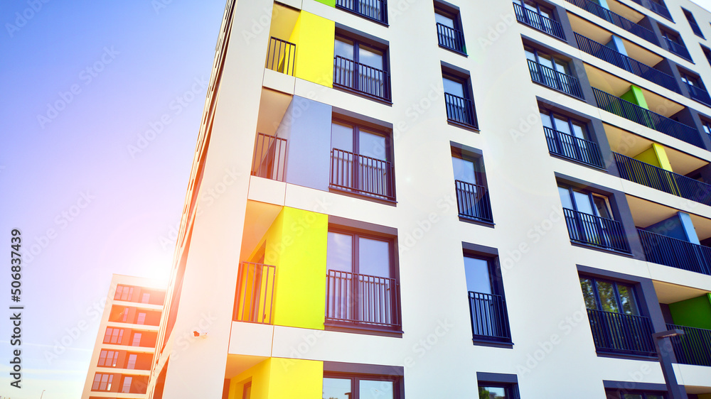 Apartment residential house and home facade architecture and outdoor facilities. Blue sky on the bac