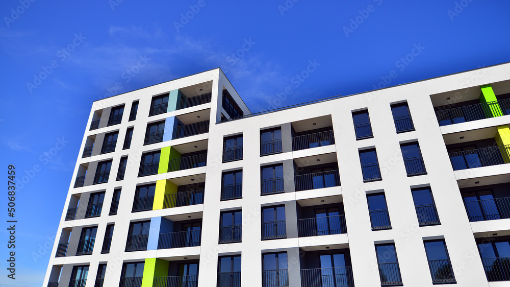 Apartment residential house and home facade architecture and outdoor facilities. Blue sky on the bac