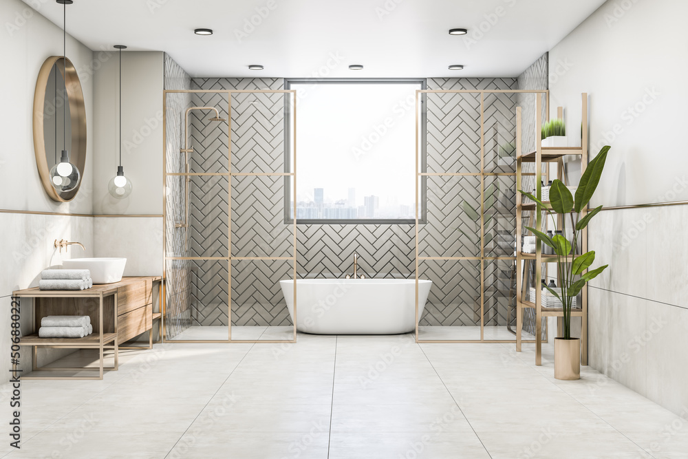 Front view on sunny modern bathroom with wooden sink cabinet, gold decorated partitions, high green 