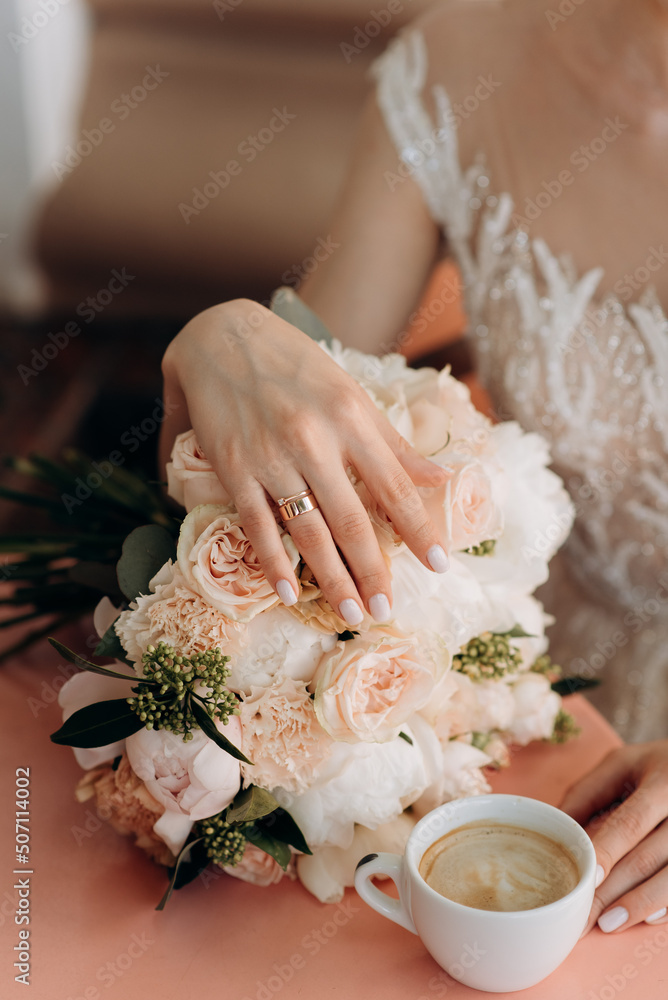 bride and groom holding hands