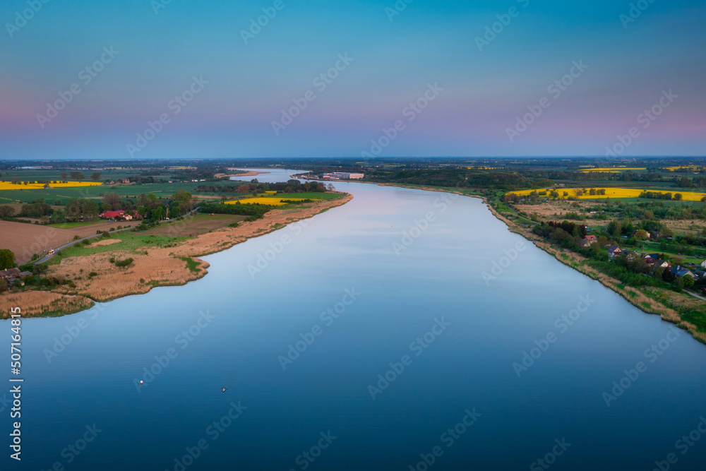 Martwa Wisla river by the Baltic Sea at sunset, Sobieszewo. Poland