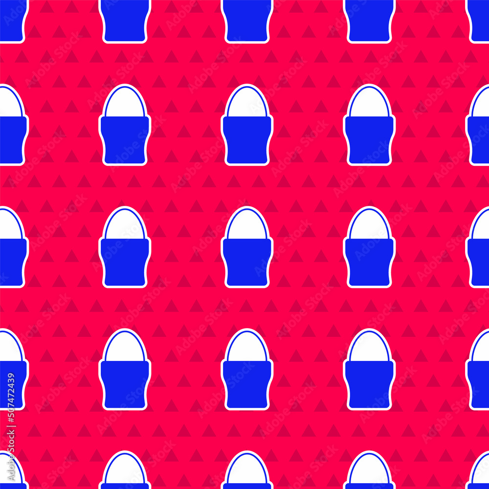 Blue Chicken egg on a stand icon isolated seamless pattern on red background. Vector