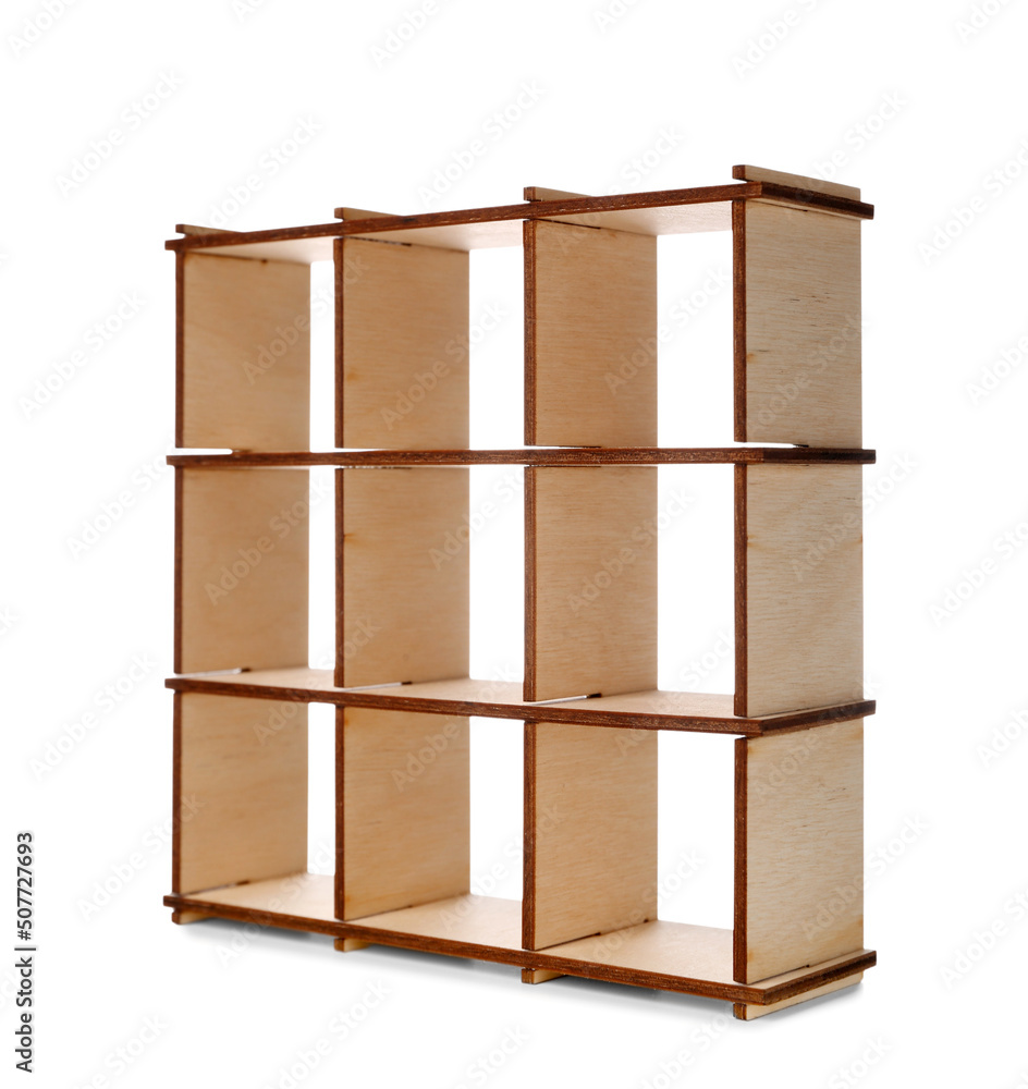 Toy wooden shelving unit on white background