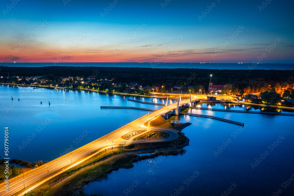 Drawbridge to Sobieszewo Island on the Martwa Wisla river at dusk. Poland