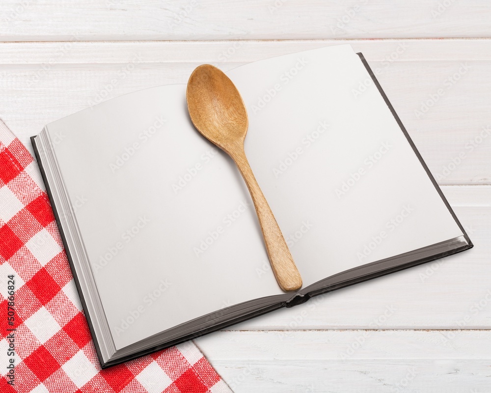 Open blank cookbook. Antique recipe book on the table.