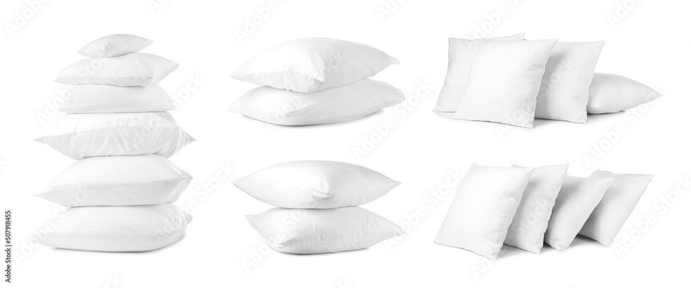 Set of many soft pillows isolated on white