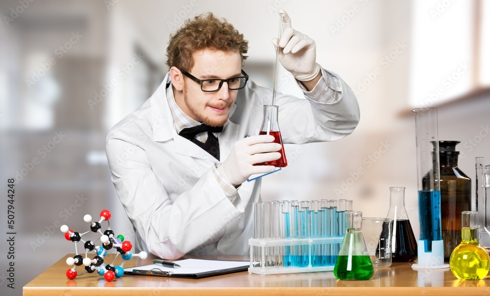 Crazy professor, scientist, lecturer with mad hairstyle wearing glasses