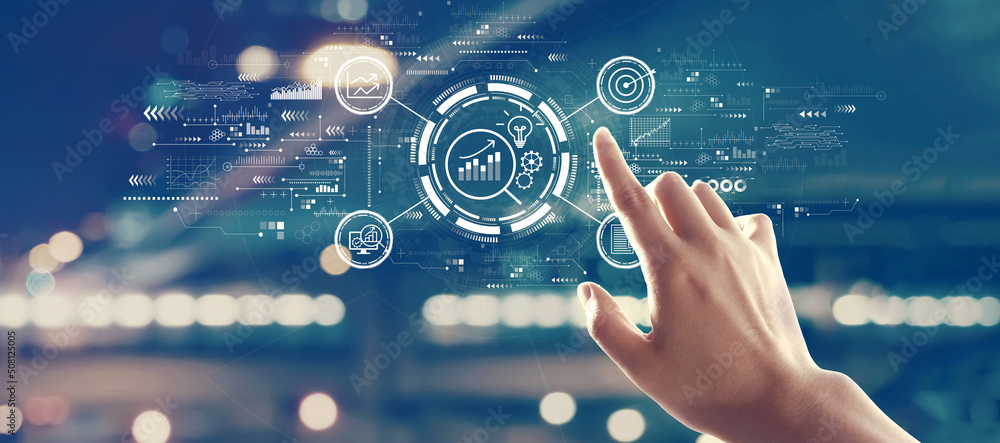 Data Analysis concept with hand pressing a button on a technology screen