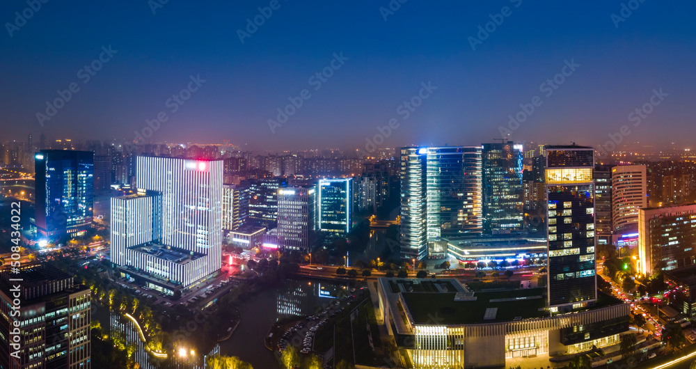 Aerial photography night view of modern buildings in Suzhou city, China