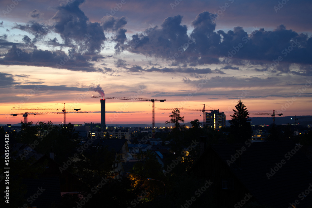 Dramatic night sky at City of Zürich with industrial skyline on a cloudy spring day. Photo taken May