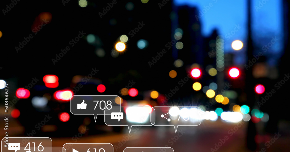 Image of social media icons and numbers over out of focus traffic lights