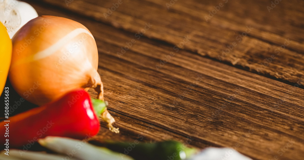 Image of fresh organic vegan food with vegetables on wooden board