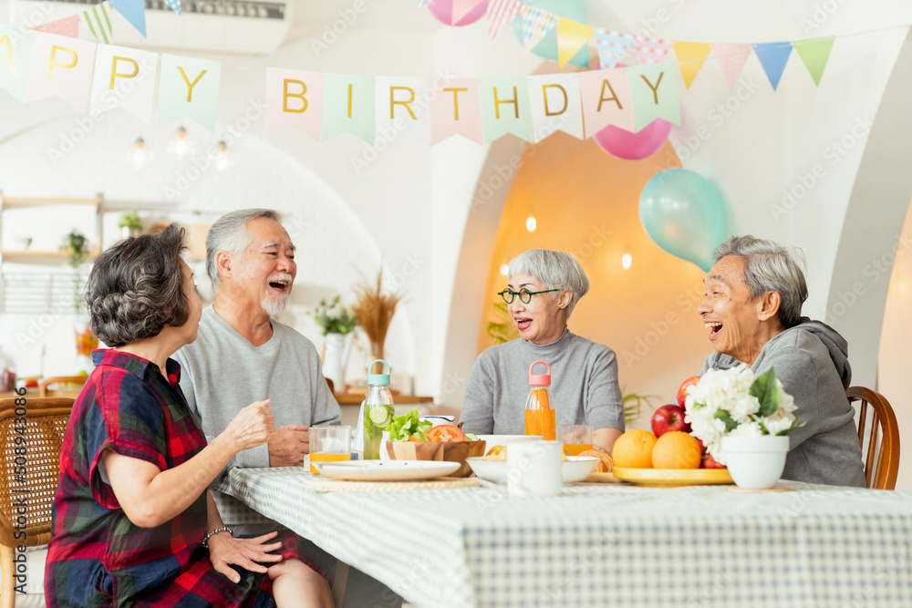 birthday party at senior daycare,group of asian female elder male female laugh smile positive conver