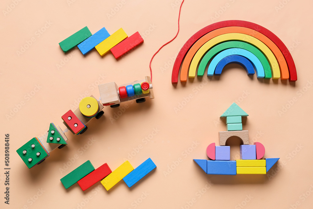 Educational toys on beige background