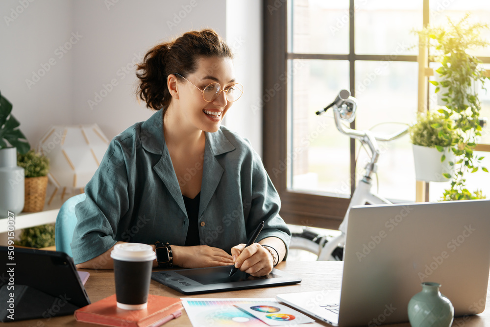 Woman is working at workshop