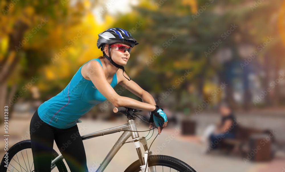 happy woman cycling athlete prepare for ride bicycle on street, road, hobby and competition in profe