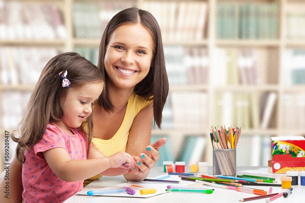 Assessment of kids mental development. Professional woman psychologist watching little child playing