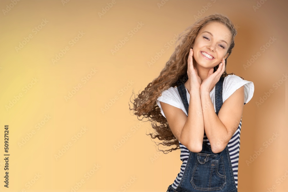 Happy young beautiful woman posing