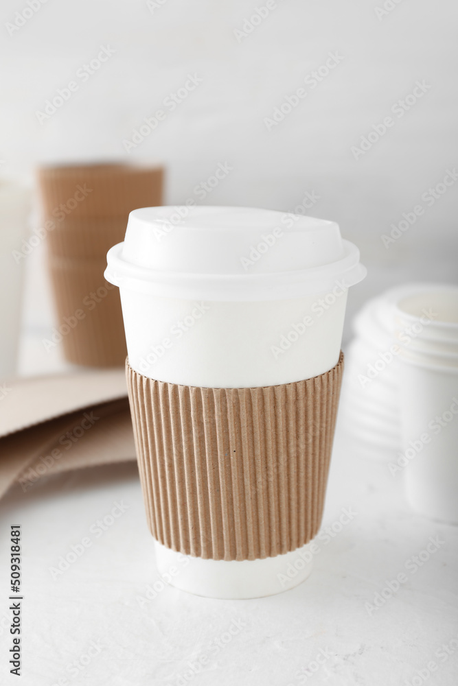 Takeaway paper cup on table