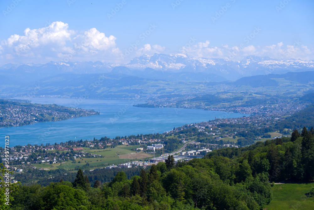 Aerial view of Lake Zürich and Canton Zürich with the Swiss Alps in the background seen from local m