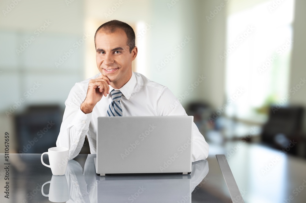 Businessman Working on Computer in Office. Successful IT Software Engineer Working on a Laptop.