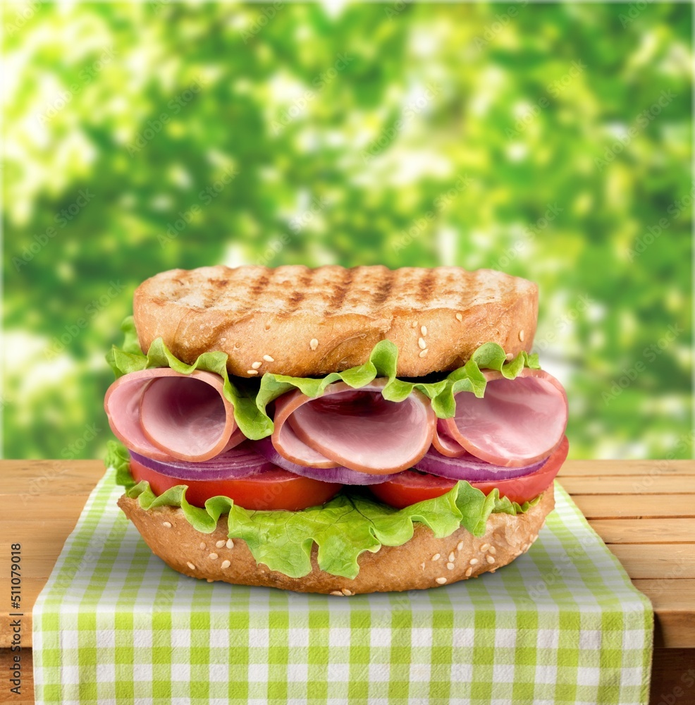 sandwich with ham, cucumber and cheese, food concept