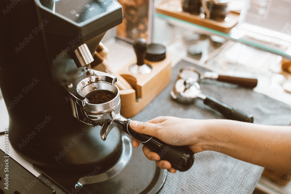 Barista making coffee with professional machine, Coffee pouring into a cup, small business, startup 