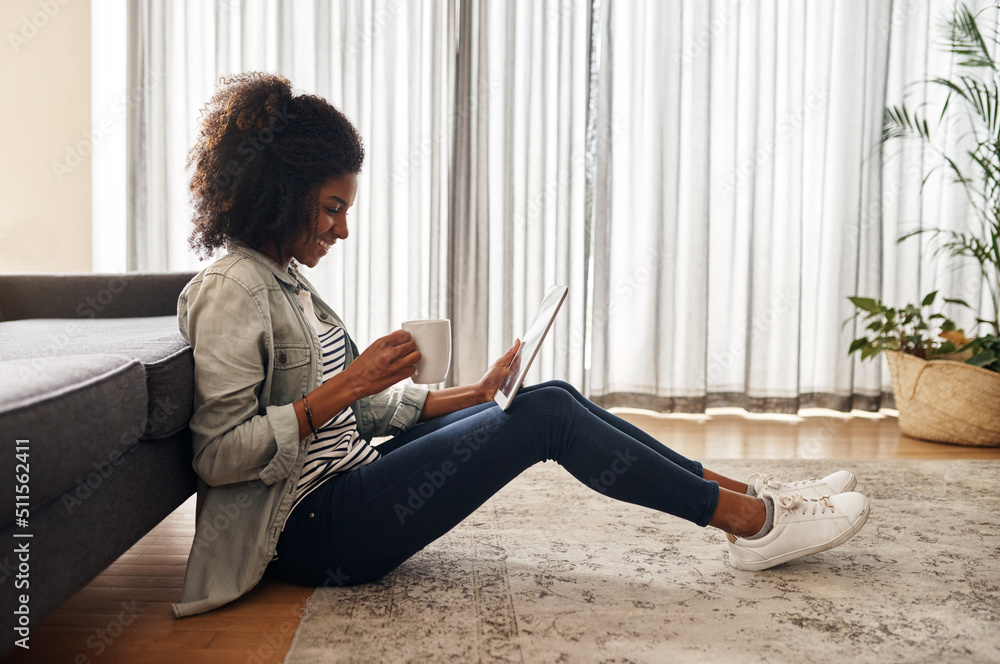 I hope my blog seems as interesting as this one. Shot of a beautiful young woman using a digital tab