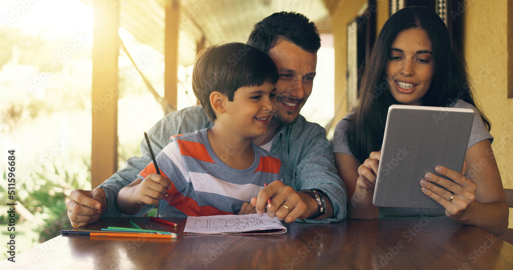 Moms colouring in online while we colour on paper. Cropped shot of a young family colouring in and u