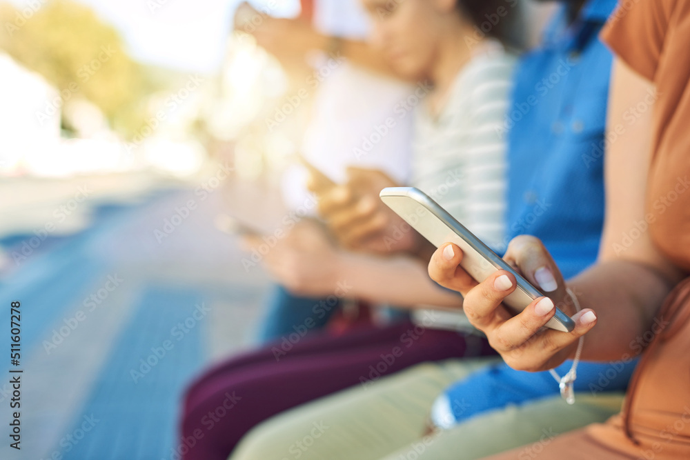 Lets see if we have any messages. Shot of a group unrecognizable people using their phones outside d