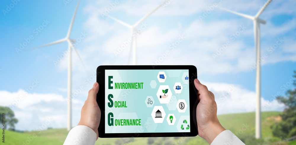 Green business transformation for environment saving and ESG business concept. Businessman using tab