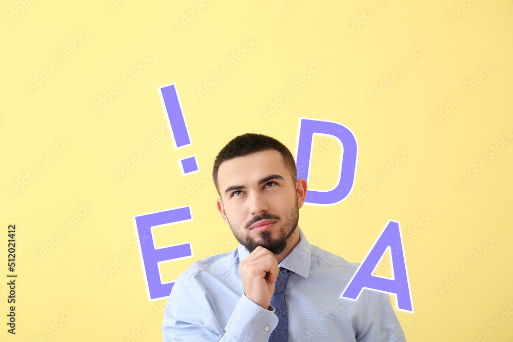 Thoughtful businessman on beige background. Concept of idea