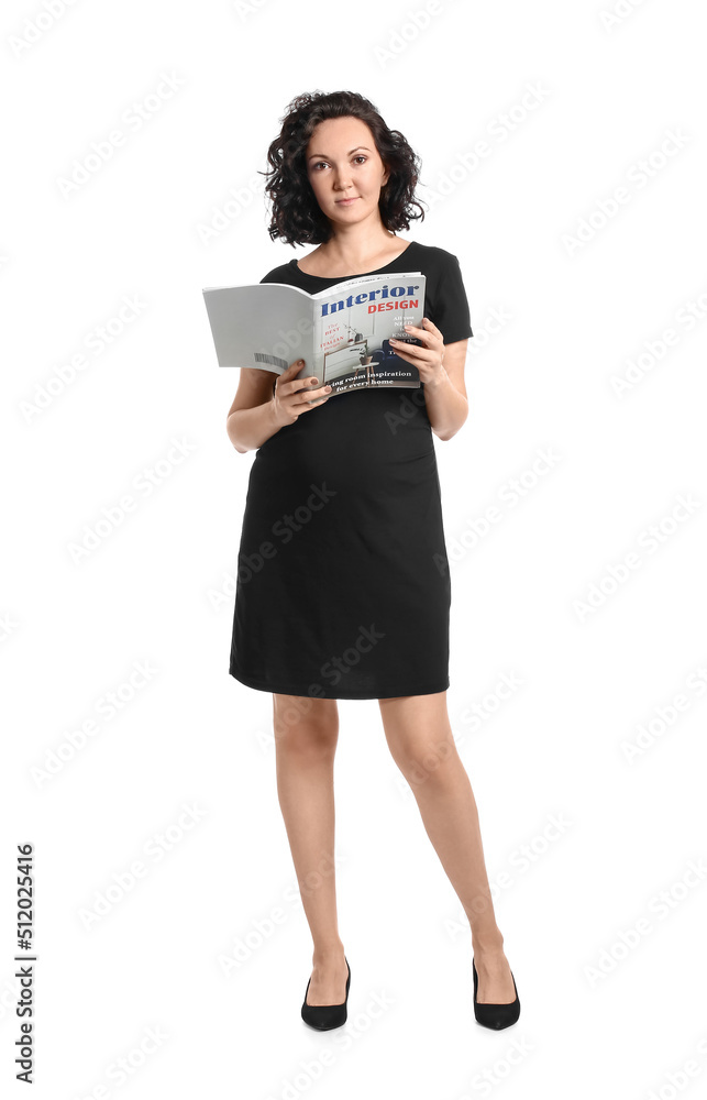 Young pregnant woman reading magazine on white background