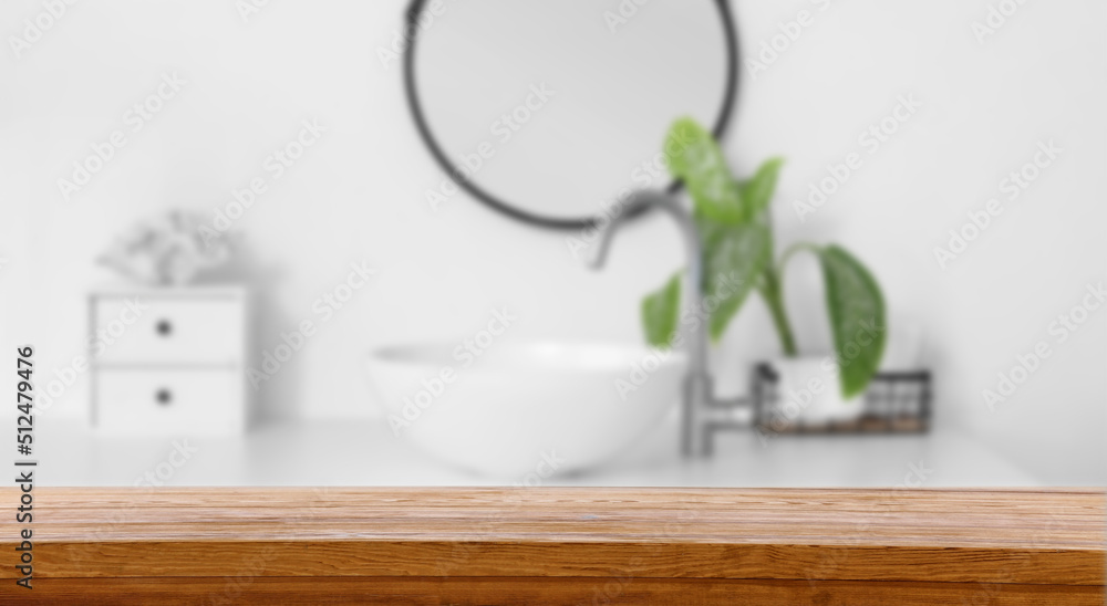 Wooden table on white background